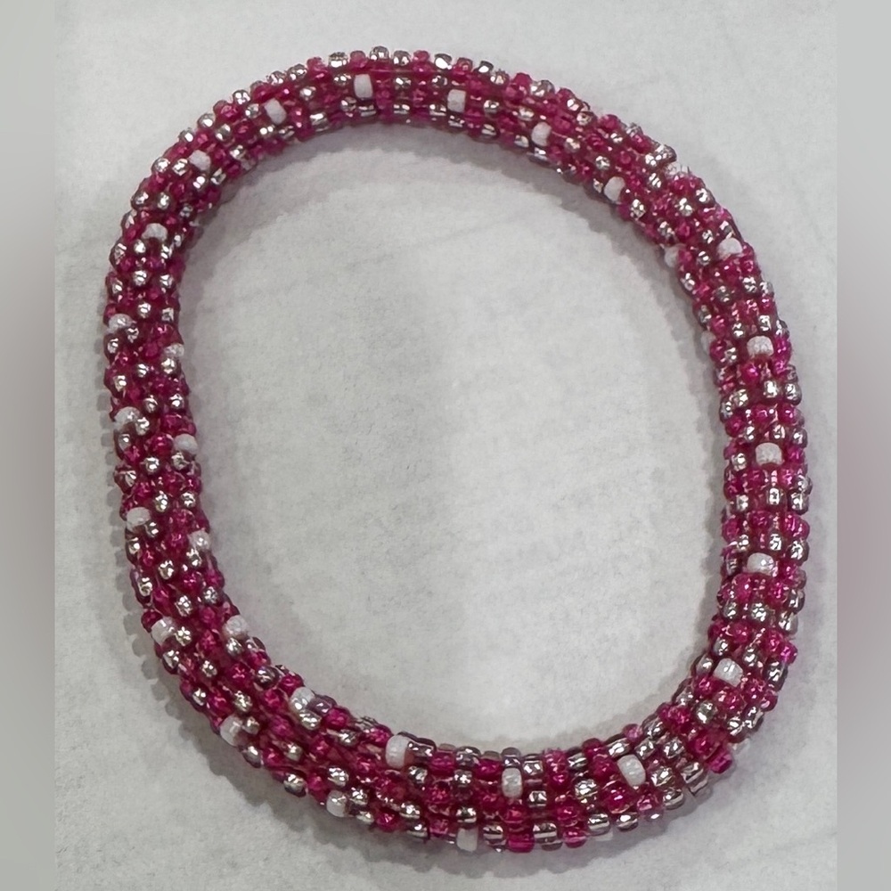 Pink, white, & silver Roll on bracelet